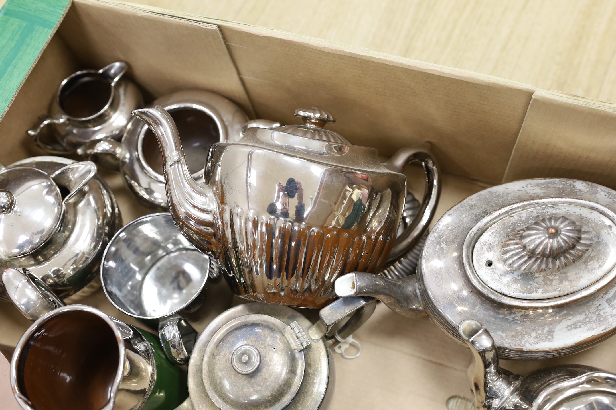 A quantity of various tea pots including Burslem, copper and plated